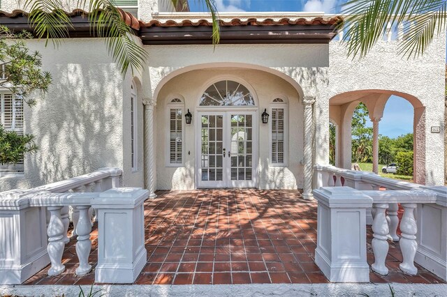 802 S 10th St, Haines City, FL 33844 - property entrance with stucco siding and french doors