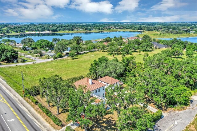 802 S 10th St, Haines City, FL 33844 - aerial view of a large body of water and a tree filled landscape