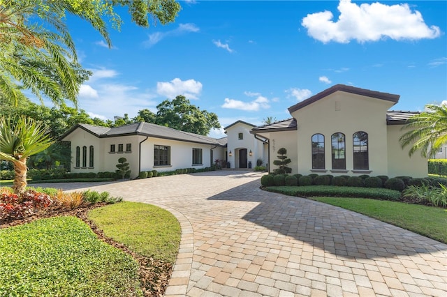 5157 Latrobe Dr, Windermere, FL 34786 - view of front of property with decorative driveway and stucco siding