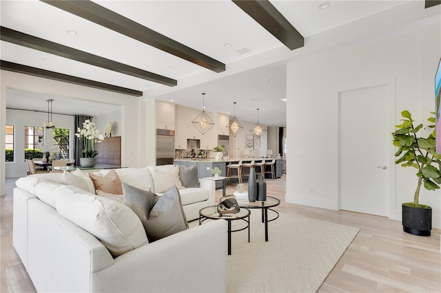 5157 Latrobe Dr, Windermere, FL 34786 - living room with beam ceiling, a chandelier, and light wood finished floors