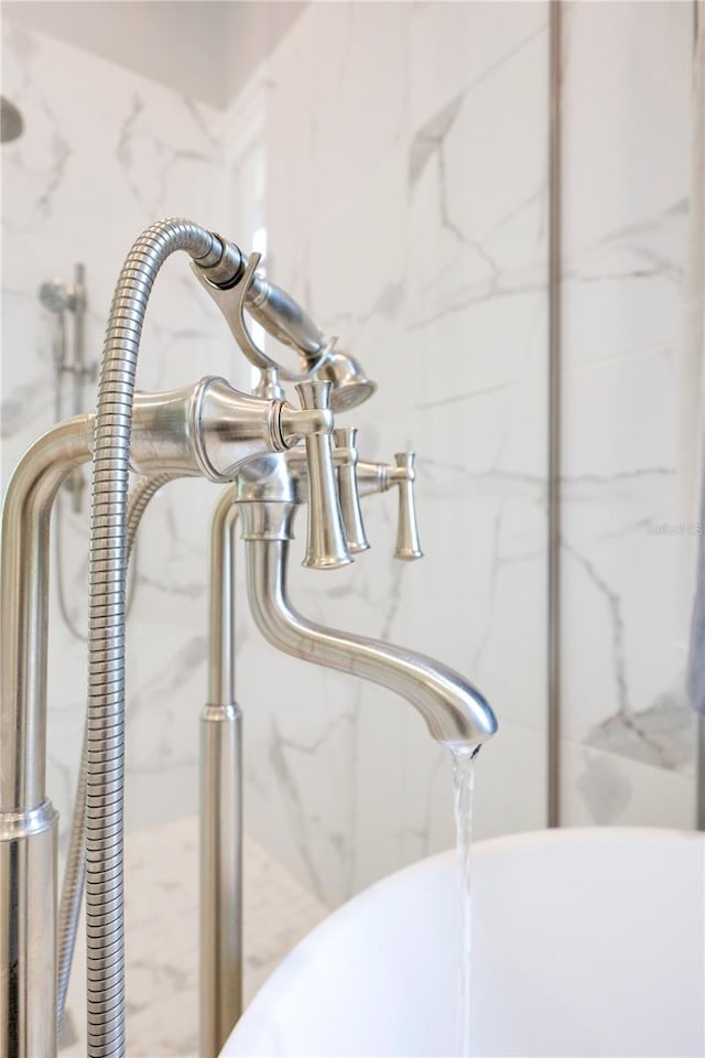 5157 Latrobe Dr, Windermere, FL 34786 - detailed view of a freestanding bath and a marble finish shower