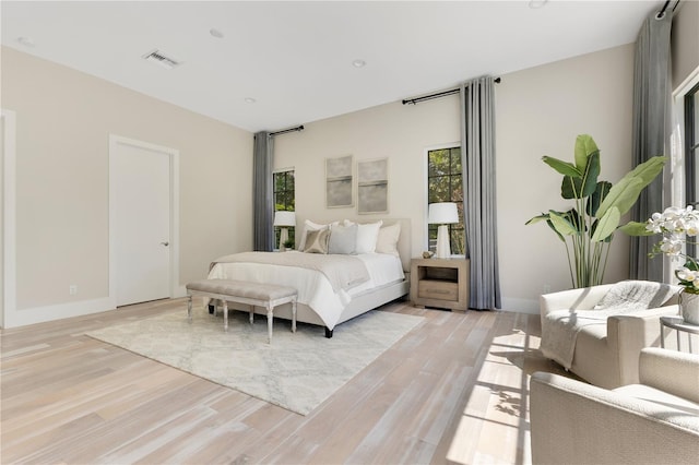 5157 Latrobe Dr, Windermere, FL 34786 - bedroom with light wood-type flooring and baseboards