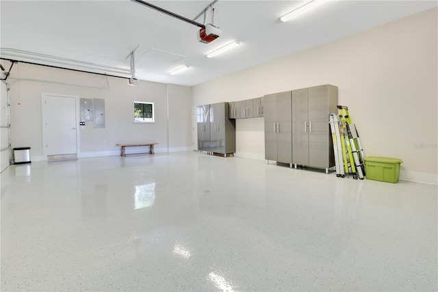 5157 Latrobe Dr, Windermere, FL 34786 - garage with a garage door opener, electric panel, and baseboards