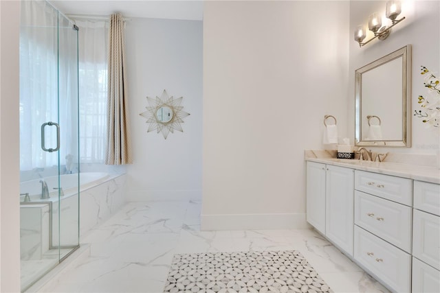 5157 Latrobe Dr, Windermere, FL 34786 - full bathroom with vanity, a garden tub, marble finish flooring, baseboards, and a marble finish shower