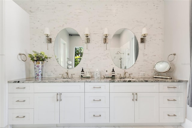 5157 Latrobe Dr, Windermere, FL 34786 - bathroom featuring double vanity and a shower