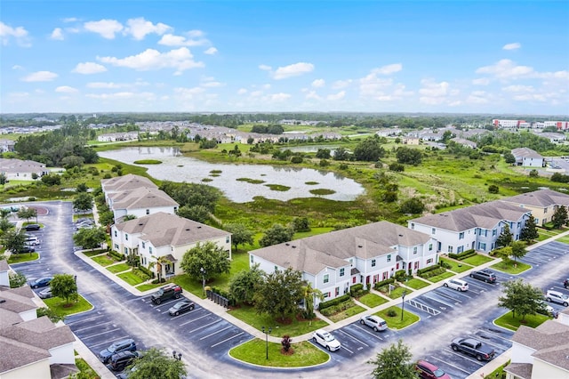 228 Primrose Dr, Davenport, FL 33837 - aerial view of residential area featuring a nearby body of water