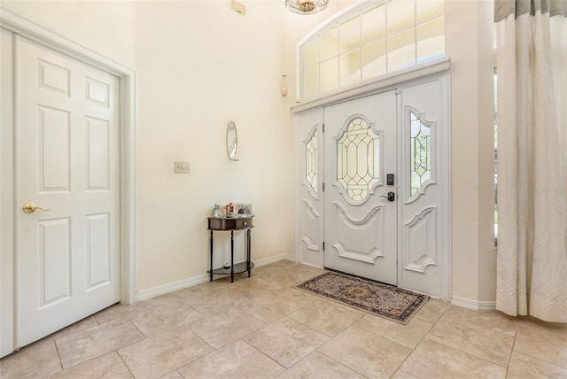 1910 Palm View Dr, Apopka, FL 32712 - foyer entrance with baseboards and a towering ceiling