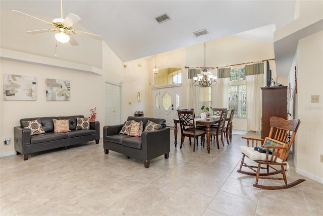 1910 Palm View Dr, Apopka, FL 32712 - living room with high vaulted ceiling, a chandelier, a ceiling fan, and baseboards