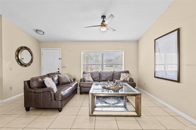 109 Coral Reef Ct N, Palm Coast, FL 32137 - living room featuring ceiling fan, light tile patterned flooring, and baseboards