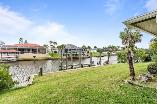 109 Coral Reef Ct N, Palm Coast, FL 32137 - dock area with a lawn, a water view, and a residential view
