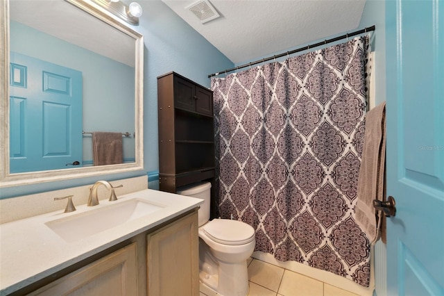 925 S Dean Cir, Deltona, FL 32738 - bathroom featuring tile patterned flooring, vanity, toilet, a textured ceiling, and a shower with shower curtain