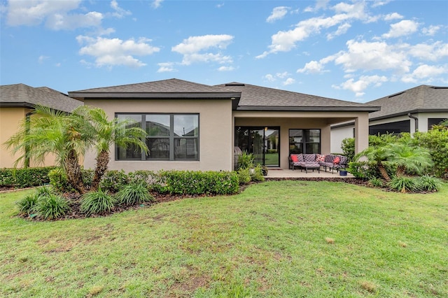 2342 Clemblue Rd, Clermont, FL 34715 - rear view of house with an outdoor hangout area, stucco siding, a yard, and a patio