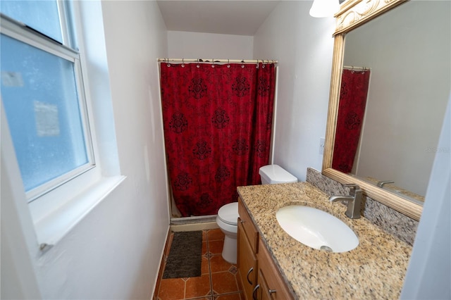 bathroom with toilet, vanity, tile patterned floors, a shower with shower curtain, and baseboards