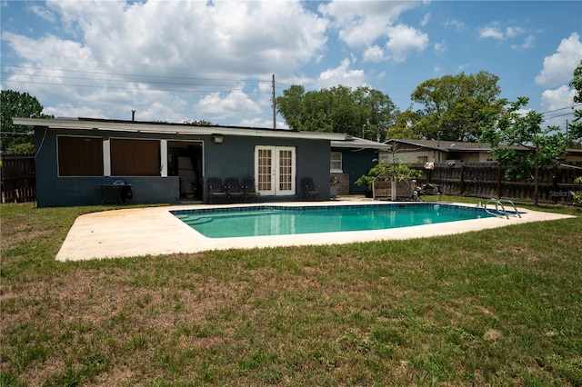 back of house featuring french doors, a patio, and stucco siding