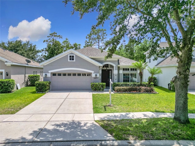 10875 Arbor View Blvd, Orlando, FL 32825 - view of front of house featuring stucco siding, an attached garage, a front lawn, and concrete driveway