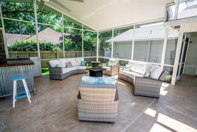 3009 Ridgevale Cir, Valrico, FL 33596 - sunroom / solarium with an outdoor living space with a fire pit and lofted ceiling