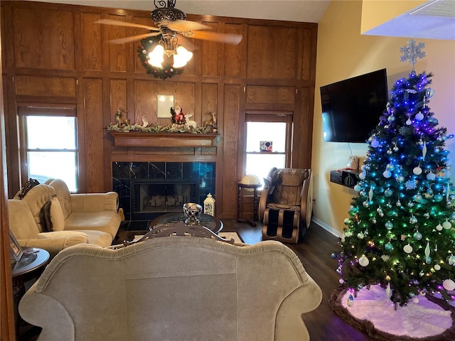 3009 Ridgevale Cir, Valrico, FL 33596 - living room with a ceiling fan, a high end fireplace, wood finished floors, and plenty of natural light