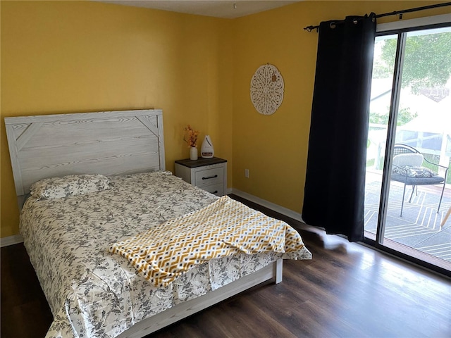 3009 Ridgevale Cir, Valrico, FL 33596 - bedroom with access to exterior, baseboards, and dark wood-style floors