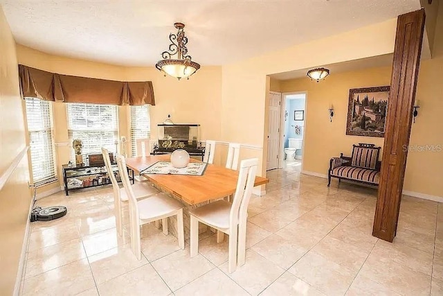 3009 Ridgevale Cir, Valrico, FL 33596 - dining space with light tile patterned flooring and baseboards