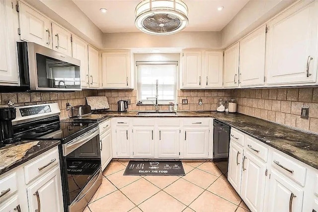 3009 Ridgevale Cir, Valrico, FL 33596 - kitchen with stainless steel appliances, a sink, white cabinetry, and recessed lighting