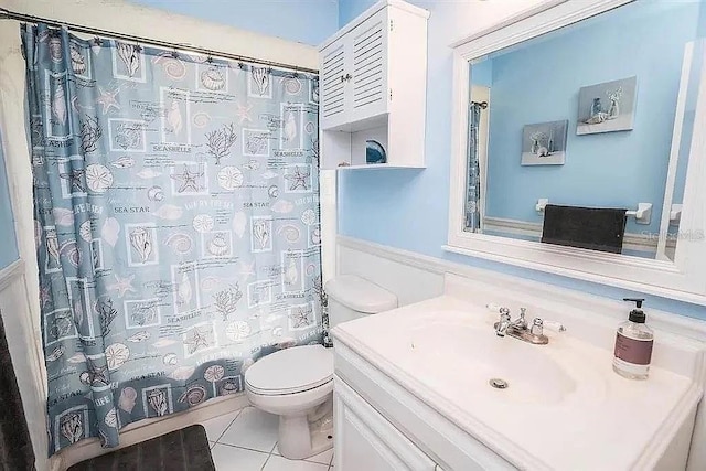 3009 Ridgevale Cir, Valrico, FL 33596 - bathroom with toilet, vanity, tile patterned floors, and curtained shower