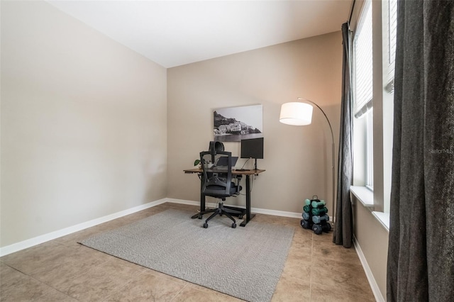 3223 Blazing Star Ln, Harmony, FL 34773 - tiled office with healthy amount of natural light and baseboards