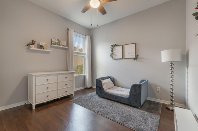 3223 Blazing Star Ln, Harmony, FL 34773 - sitting room with ceiling fan, dark wood-type flooring, and baseboards