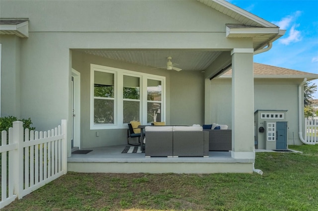 3223 Blazing Star Ln, Harmony, FL 34773 - rear view of house with a ceiling fan, stucco siding, and outdoor lounge area