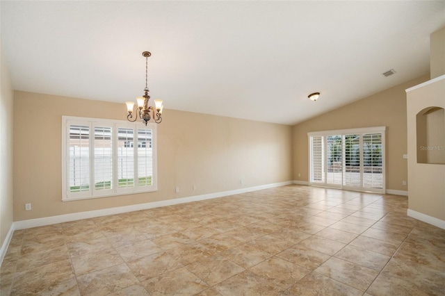 2830 Alton Dr, Kissimmee, FL 34741 - spare room featuring a chandelier, baseboards, light tile patterned floors, and vaulted ceiling