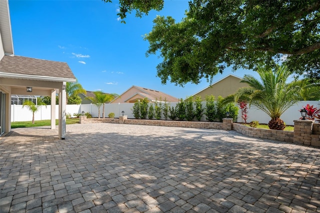 2830 Alton Dr, Kissimmee, FL 34741 - fenced backyard with a patio
