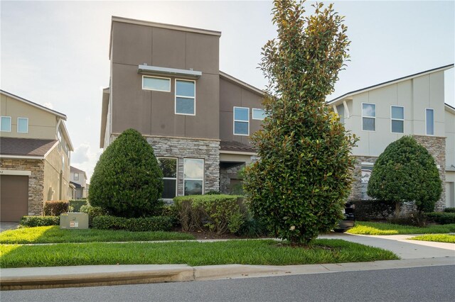 1836 Sandy Park Trl, Kissimmee, FL 34747 - contemporary home with stone siding and stucco siding