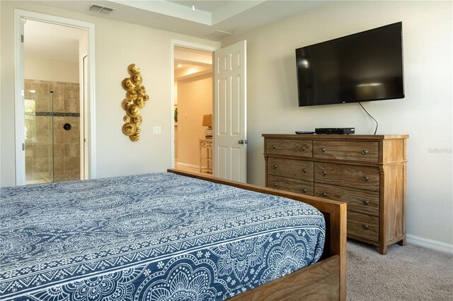 1836 Sandy Park Trl, Kissimmee, FL 34747 - carpeted bedroom featuring baseboards and ensuite bath