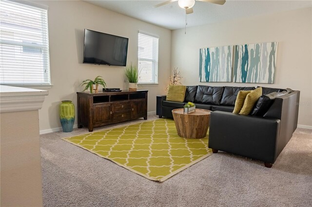 1836 Sandy Park Trl, Kissimmee, FL 34747 - living room with ceiling fan, carpet floors, and baseboards