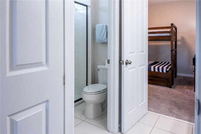 1836 Sandy Park Trl, Kissimmee, FL 34747 - bathroom featuring toilet, a shower stall, and tile patterned flooring