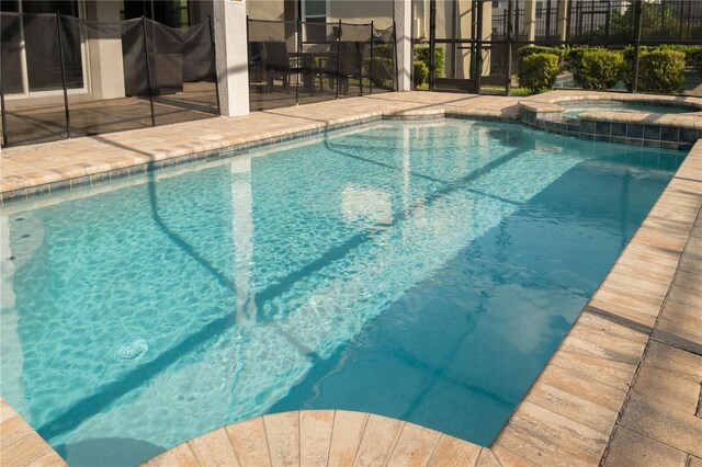 1836 Sandy Park Trl, Kissimmee, FL 34747 - view of pool featuring a patio and a pool with connected hot tub