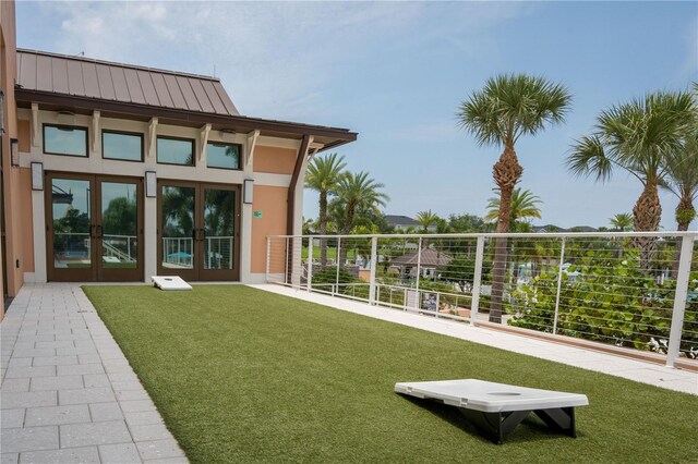 1836 Sandy Park Trl, Kissimmee, FL 34747 - view of green lawn with french doors