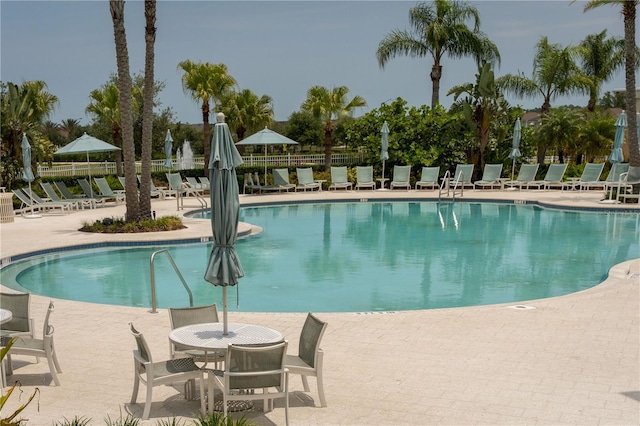 1836 Sandy Park Trl, Kissimmee, FL 34747 - community pool with a patio area
