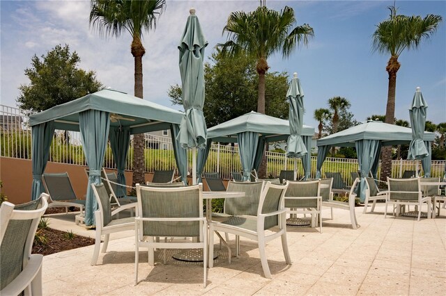 1836 Sandy Park Trl, Kissimmee, FL 34747 - view of patio featuring outdoor dining area and a gazebo