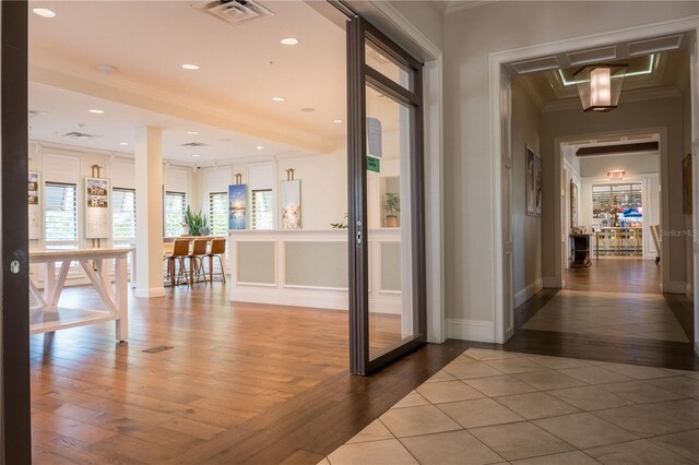 1836 Sandy Park Trl, Kissimmee, FL 34747 - hall featuring crown molding, hardwood / wood-style floors, baseboards, and recessed lighting