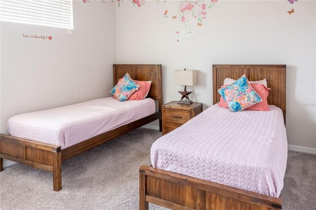 1836 Sandy Park Trl, Kissimmee, FL 34747 - carpeted bedroom featuring baseboards