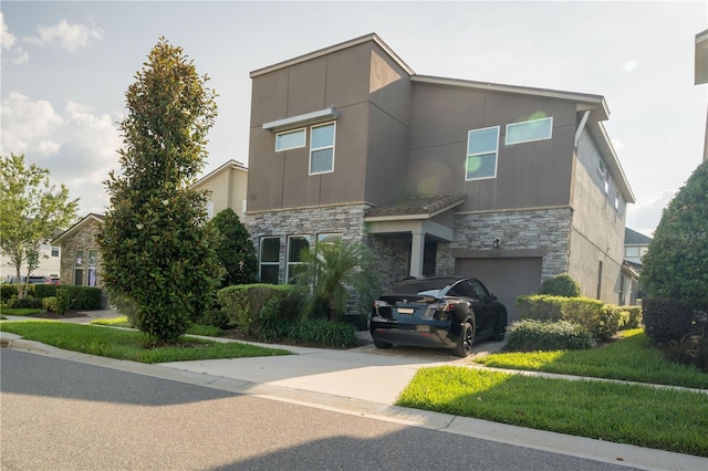 1836 Sandy Park Trl, Kissimmee, FL 34747 - contemporary home featuring stone siding, a garage, stucco siding, and driveway