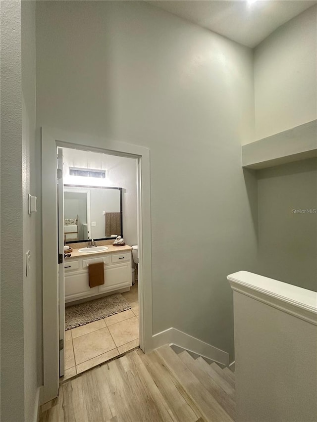 7544 Red Mill Cir, New Port Richey, FL 34653 - bathroom featuring vanity and wood finished floors