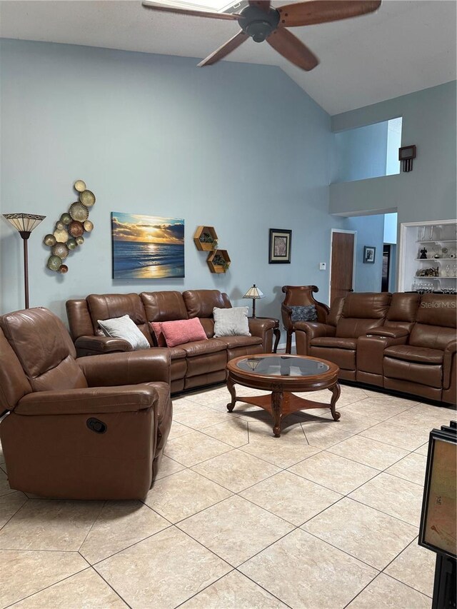 4186 Buglers Rest Pl, Casselberry, FL 32707 - living room with high vaulted ceiling, ceiling fan, and light tile patterned flooring