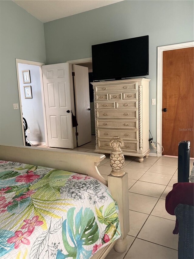 4186 Buglers Rest Pl, Casselberry, FL 32707 - bedroom with light tile patterned floors