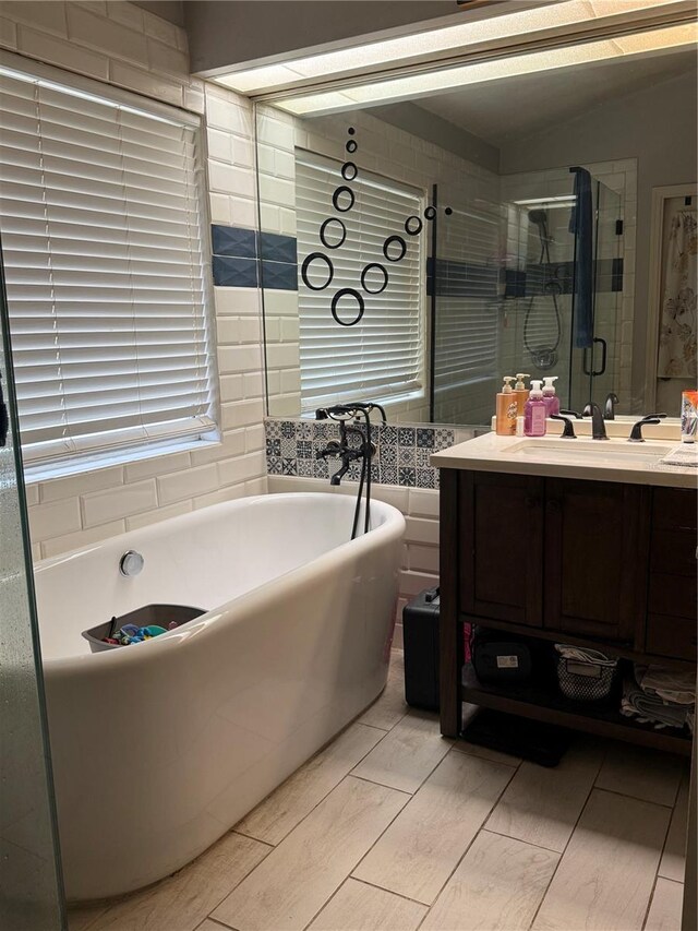 4186 Buglers Rest Pl, Casselberry, FL 32707 - full bath featuring a freestanding tub, vanity, and a shower stall