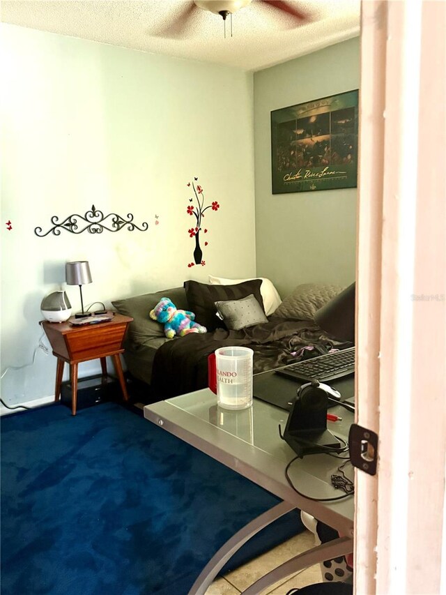 4186 Buglers Rest Pl, Casselberry, FL 32707 - bedroom featuring carpet, ceiling fan, and a textured ceiling