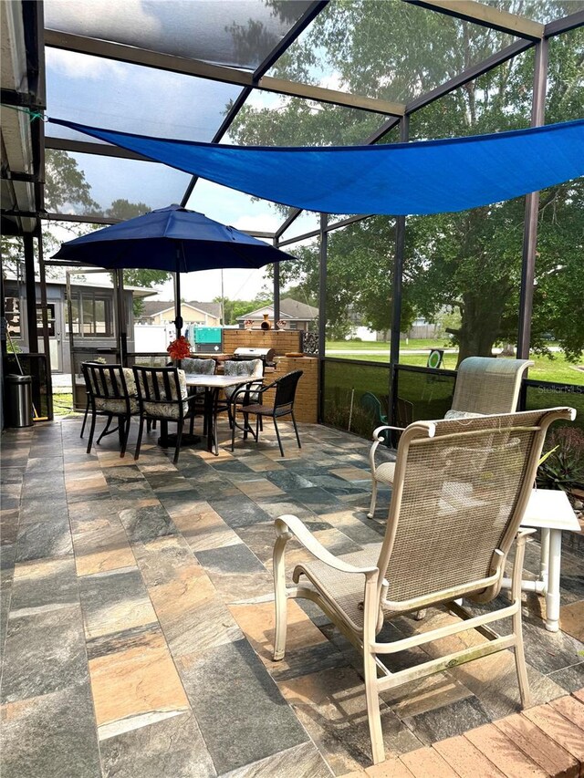 4186 Buglers Rest Pl, Casselberry, FL 32707 - view of patio featuring outdoor dining space and a lanai