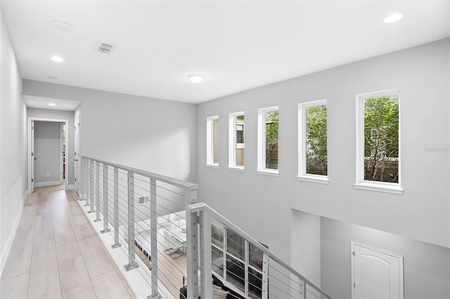 14126 Walcott Ave, Orlando, FL 32827 - hall with an upstairs landing, recessed lighting, and baseboards