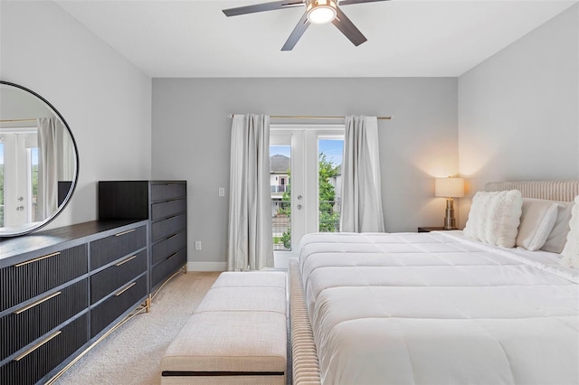 14126 Walcott Ave, Orlando, FL 32827 - bedroom with access to outside, light colored carpet, a ceiling fan, and baseboards