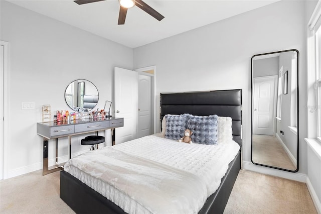 14126 Walcott Ave, Orlando, FL 32827 - bedroom featuring light carpet, baseboards, and a ceiling fan